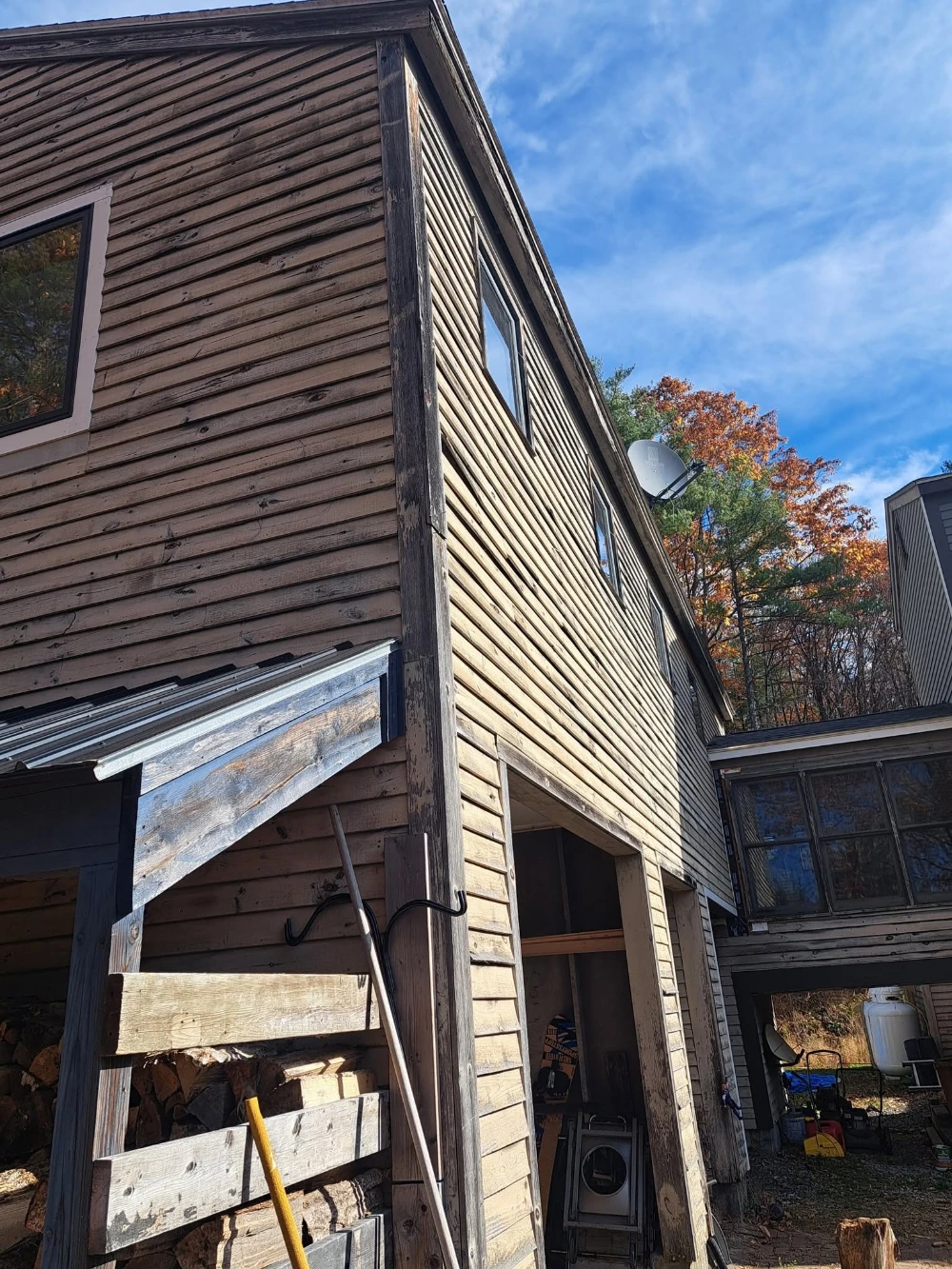 Exterior siding and trim carpentry in progress on a New England home
