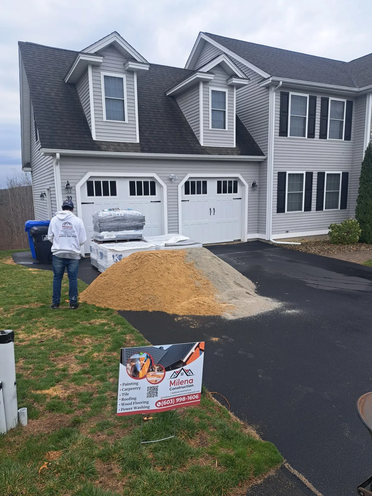 Home exterior with a two-car garage in Southern New Hampshire