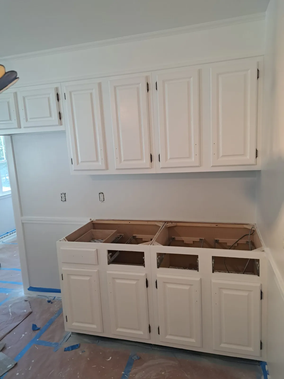 White built-in cabinets and shelving after finish carpentry