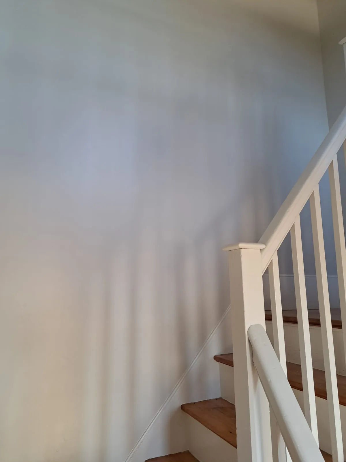 Freshly painted staircase and balusters