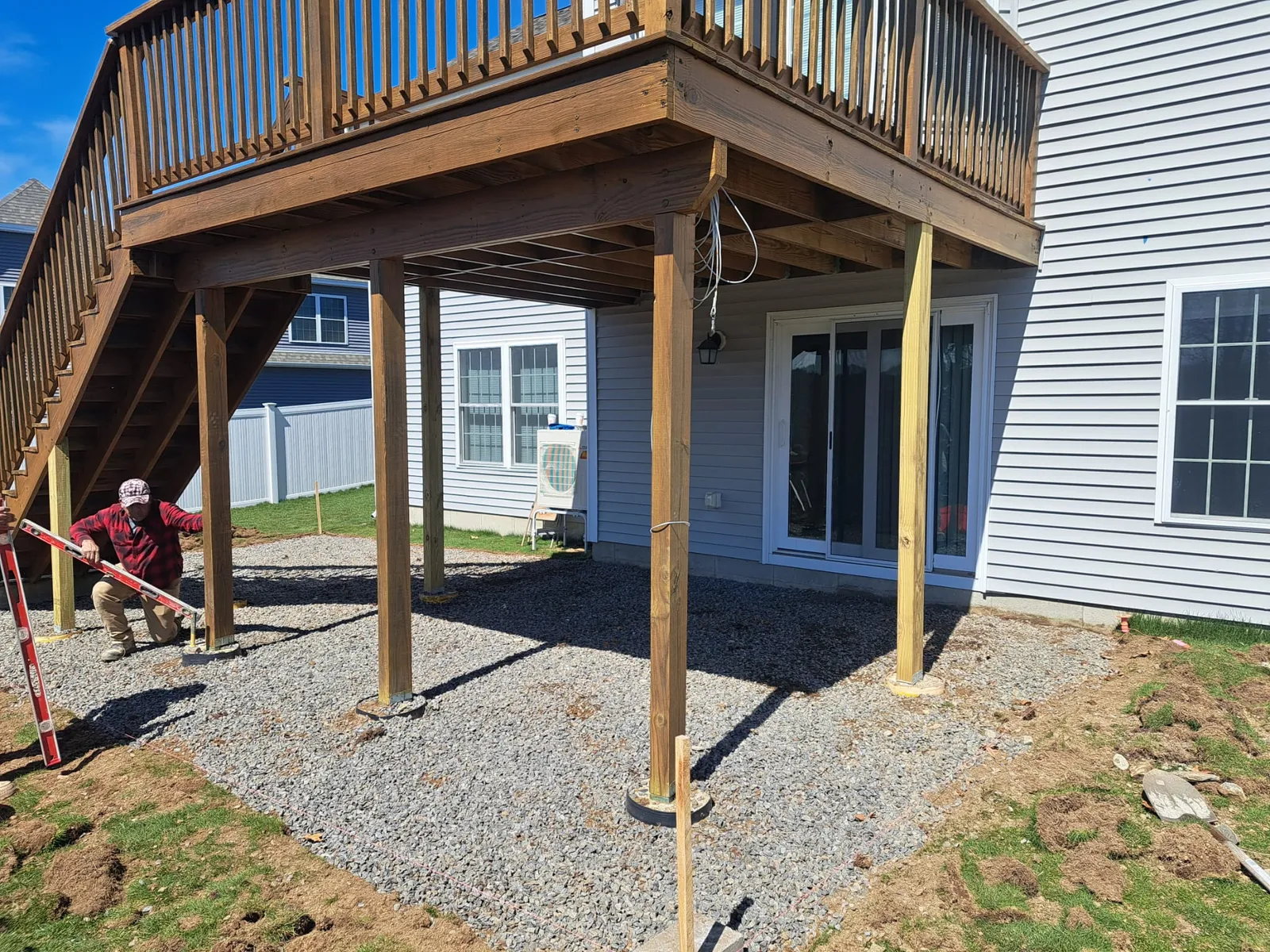 Framing and posts beneath a new elevated deck