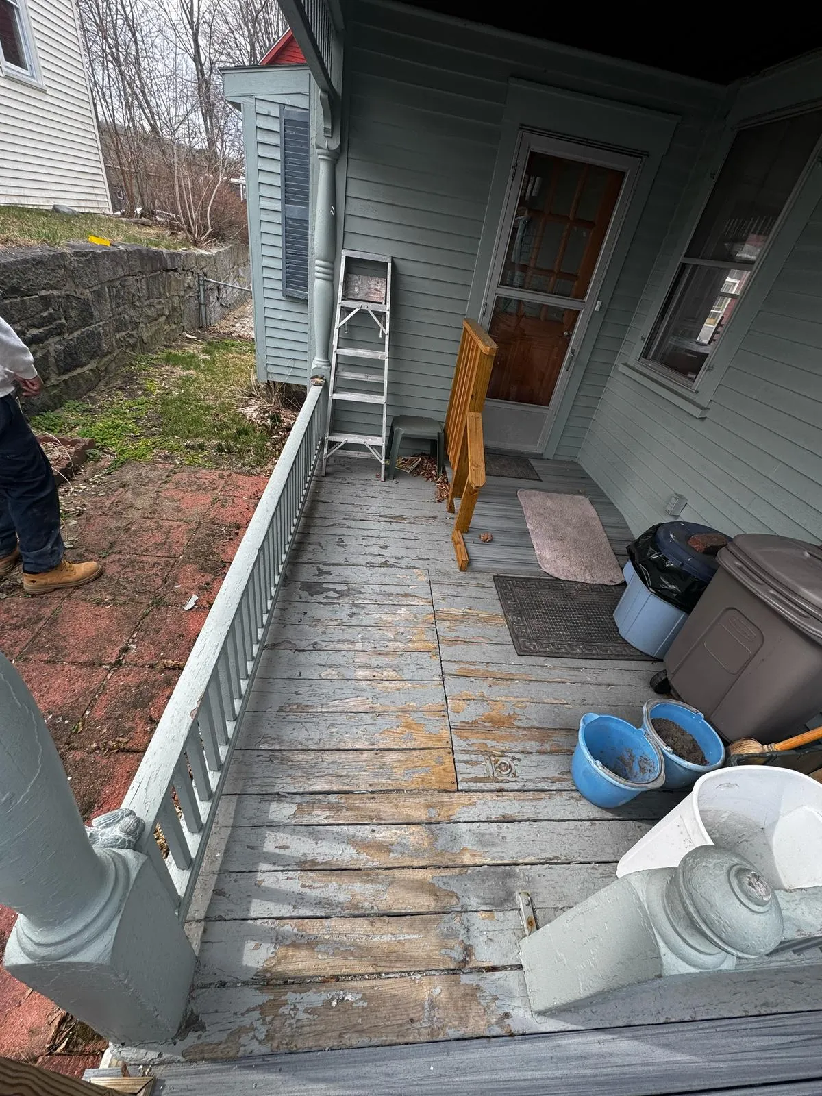Paver walkway installation along the side of a home