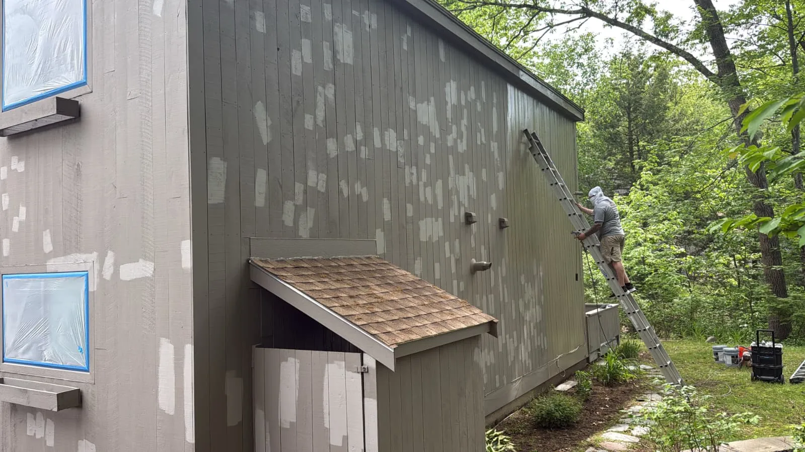 Home exterior spot-primed before repainting