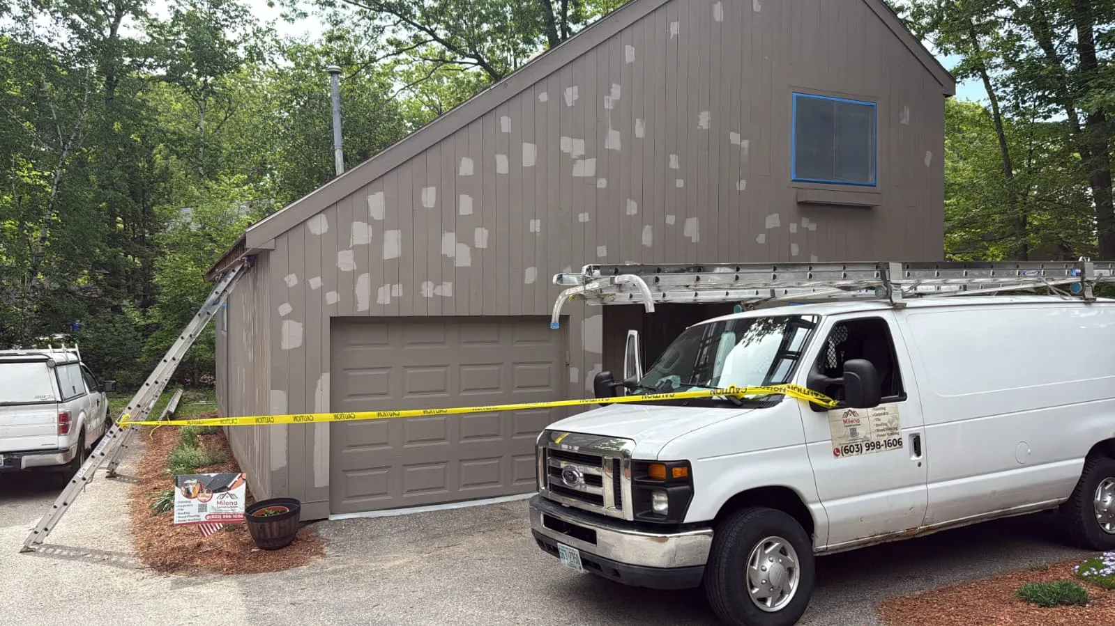 Company van at a contemporary home exterior project