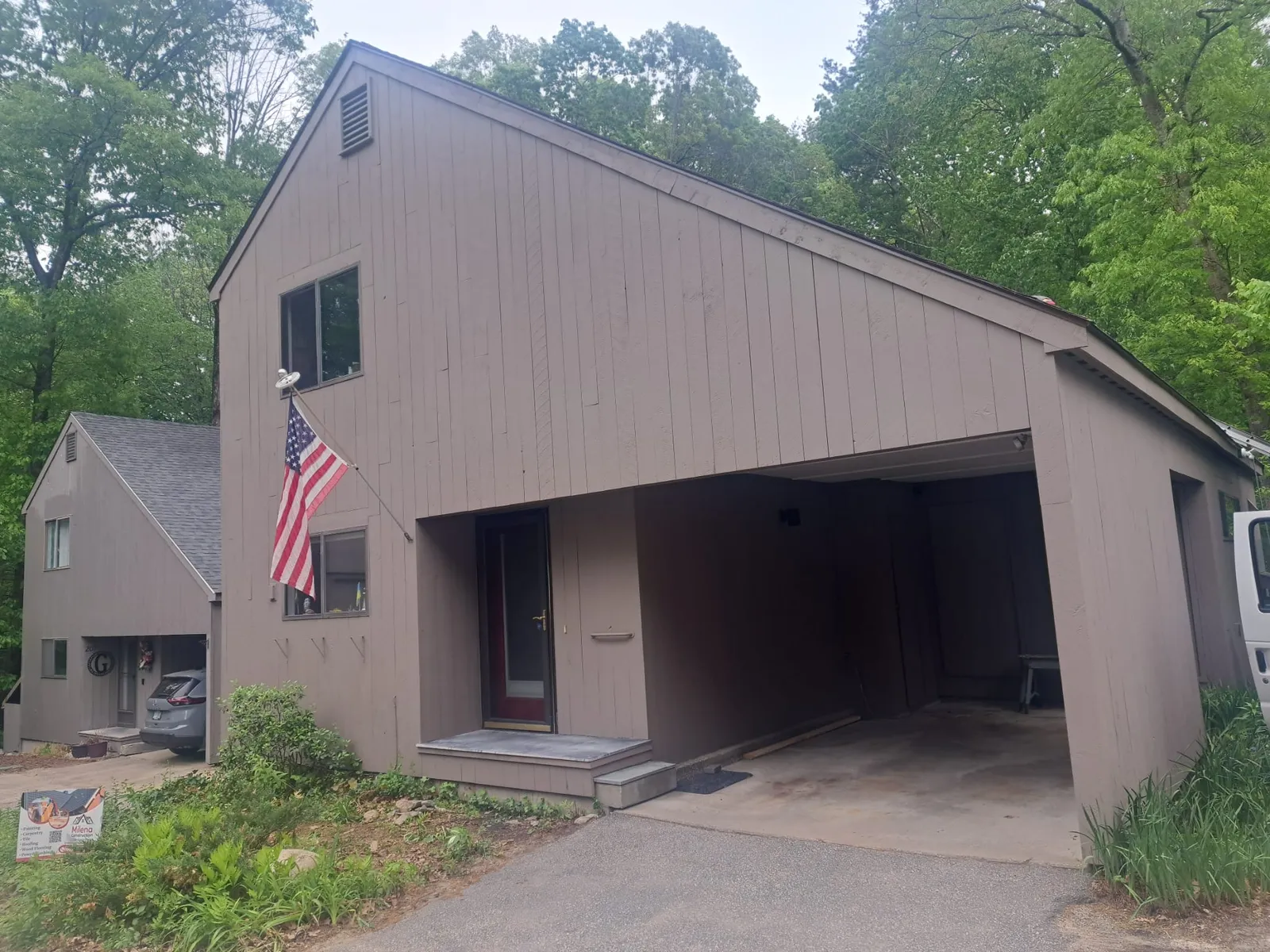 Contemporary home with an attached garage after an exterior repaint