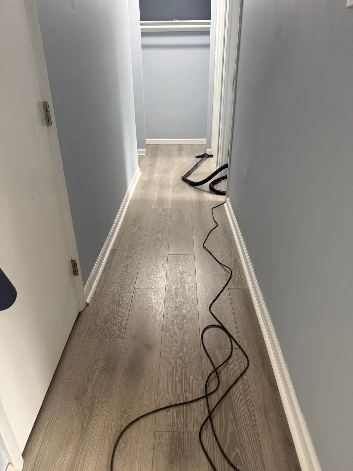 Hallway with freshly installed luxury vinyl plank flooring