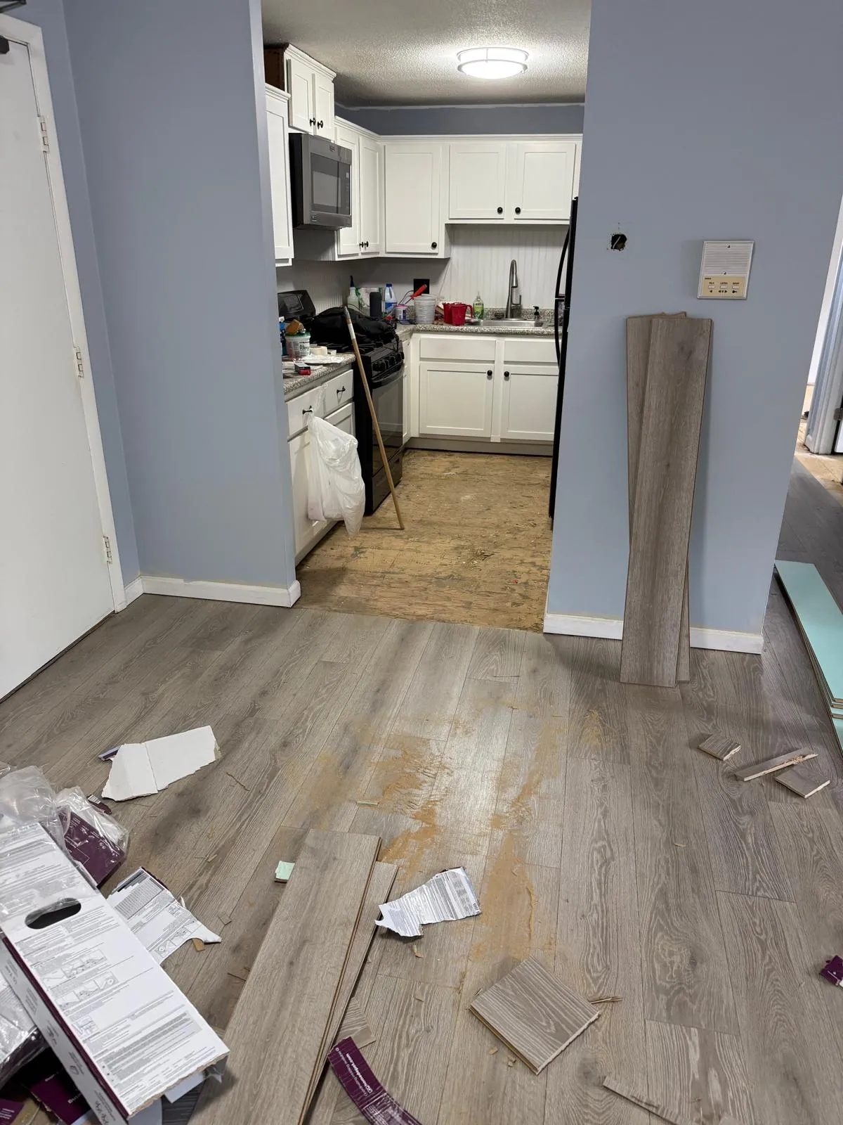 Kitchen with new wood-look vinyl plank flooring